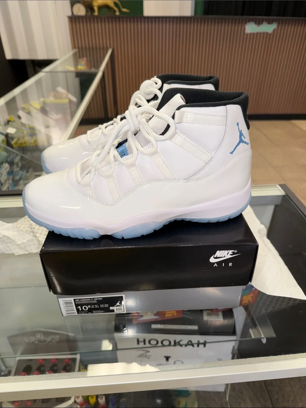 Jordan 11 Legend Blues Sneakers in White with Light Blue Accents